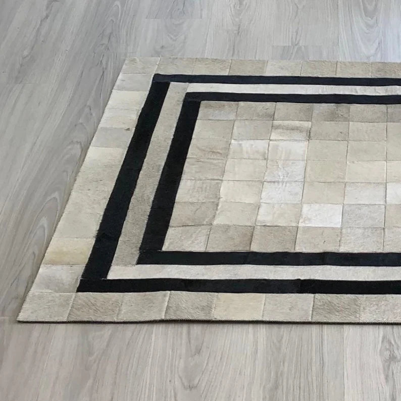 White Cowhide Patchwork Rug with Black Borders, Handmade Natural Area Rug