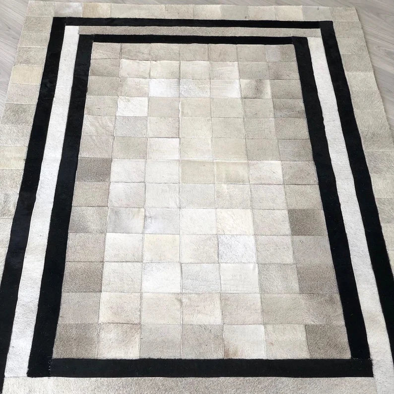 White Cowhide Patchwork Rug with Black Borders, Handmade Natural Area Rug