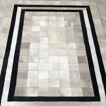 White Cowhide Patchwork Rug with Black Borders, Handmade Natural Area Rug